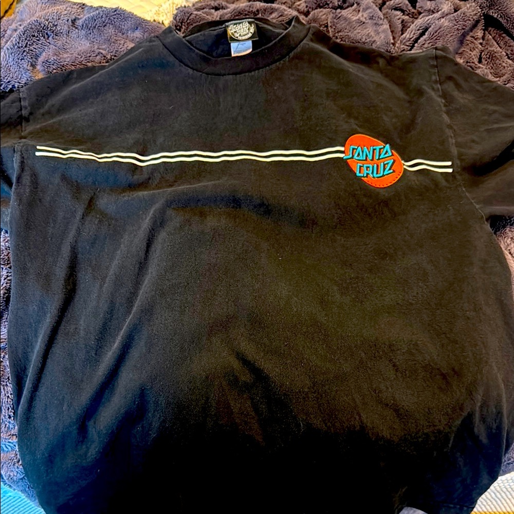 Santa Cruz Skateboards men’s t-shirt. Size XL. Shirt is in good worn condition.
